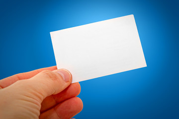Business card in the hand