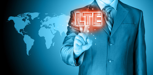 businessman is pushing his finger on lte button