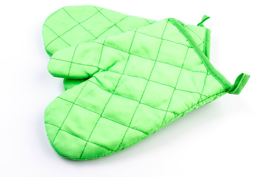 Green oven glove on isolated white background