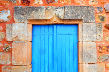The closed blue door