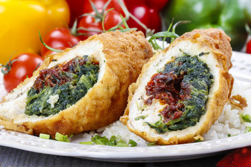 Chicken roll stuffed with spinach and dried tomatoes