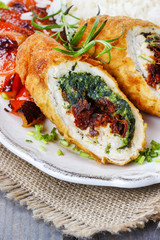 Chicken roll stuffed with spinach and dried tomatoes