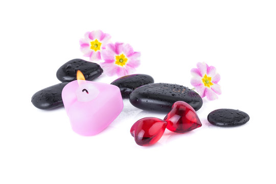Red Hearts with Spa Stones and burning Candle