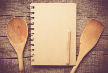 Old paper and wooden spoon - menu concept