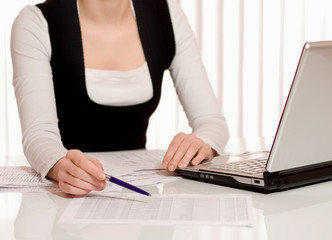 Person signing important document isolated
