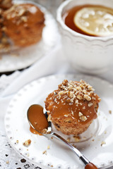 Muffins with caramel frosting and nuts