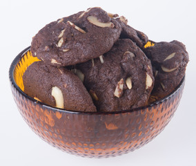Almonds chocolate chips cookies on background