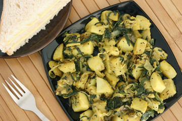 Saag Aloo Bhuna – Potato and Spinach dish