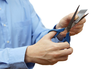 reduce your credit card debt concept with scissors and credit ca