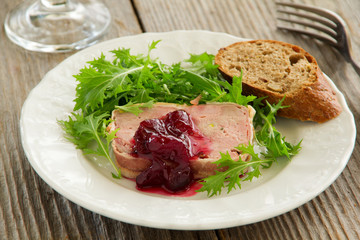 Duck terrine with pistachios and cherries.