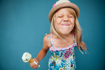 Young girl holding ice cream cone