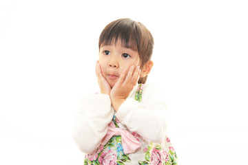 複雑な表情な女の子