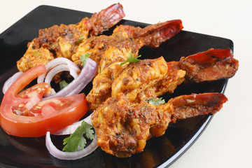 Tawa Prawn – Goan dish made of prawns skewered and cooked on taw