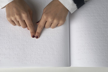 Blind reading text in braille language