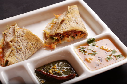 Ragi Dosa is a fermented crepe or pancake made from Ragi batter