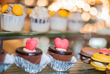 Wedding cupcake with love shaped decoration on top