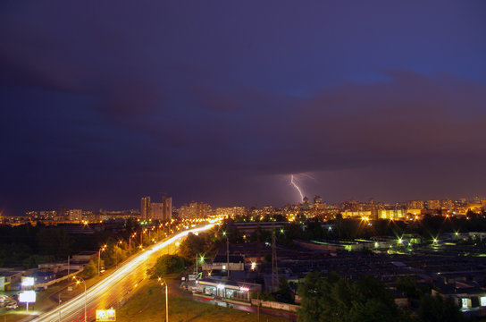 Thunderstorm with lightning in the city