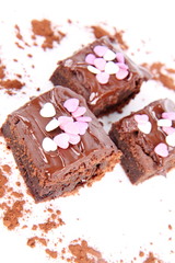 Brownie with chocolate and sugar hearts decoration