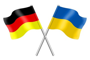 Deutsche und ukrainische Fahnen
