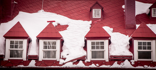 red roof with snow