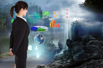 Composite image of businesswoman standing