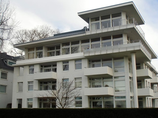 The image of the white residential building