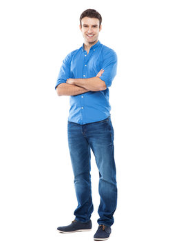 Young Man Standing Against White Background