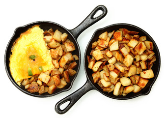 Denver Omelette and Ranch Potatoes in Cast Iron Skillet Isolated
