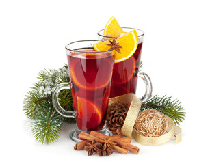 Christmas mulled wine with spices and snowy fir tree