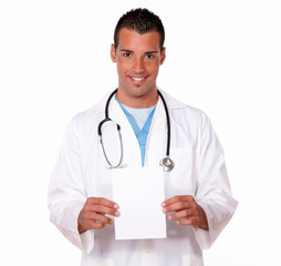 Fototapeta premium Male hispanic doctor holding a blank card
