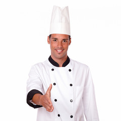 Handsome male chef with greeting gesture