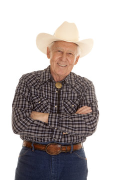 Elderly man cowboy arms folded