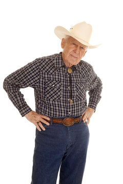 Elderly man cowboy hands hips