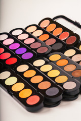Cosmetics. Colorful eye shadows palette. Makeup background