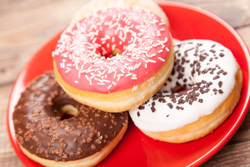 Obraz na płótnie Canvas Tasty donuts