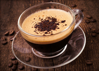 coffee with foam in glass cup