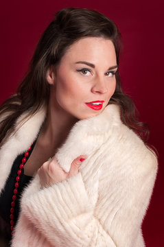 Pinup Girl in Creamy Fur Coat