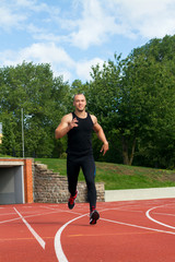 Obraz premium Image of muscle man running on stadium