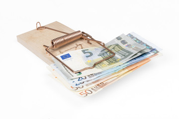 Mouse trap with Euro bills over white with clipping path.