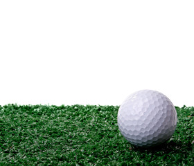 Golf ball ower green grass