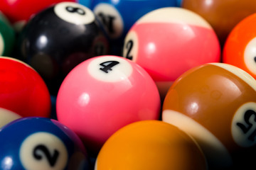 Close-Up Of Pool Balls On Blue Pool Table