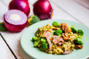 Brown rice with vegetables(onions,mushrooms,broccoli) and tofu