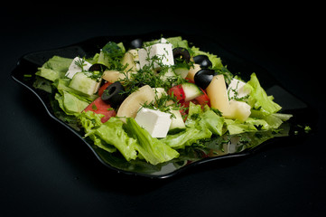 greek salad on black - griechischer salat