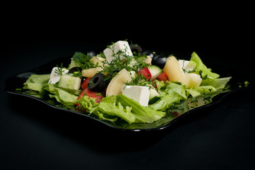 greek salad on black - griechischer salat
