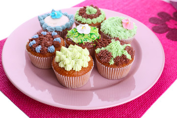 Tasty cupcakes with butter cream,
