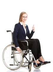 Beautiful caucasain business woman sitting on wheelchair.