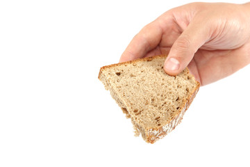 Bread slice in hand on white background.