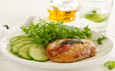 Saltimbocca with cucumber salad.