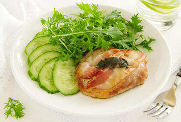 Saltimbocca with cucumber salad.