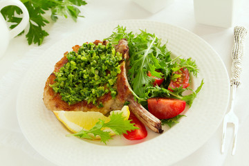 natural cutlet on the bone with gremolatoy.
